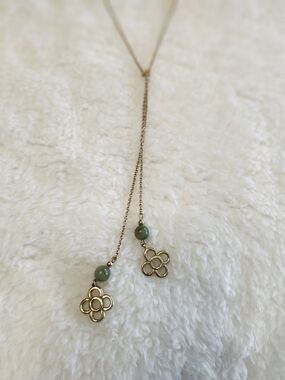 Gold Floral Lariat Necklace with Green Bead Accents